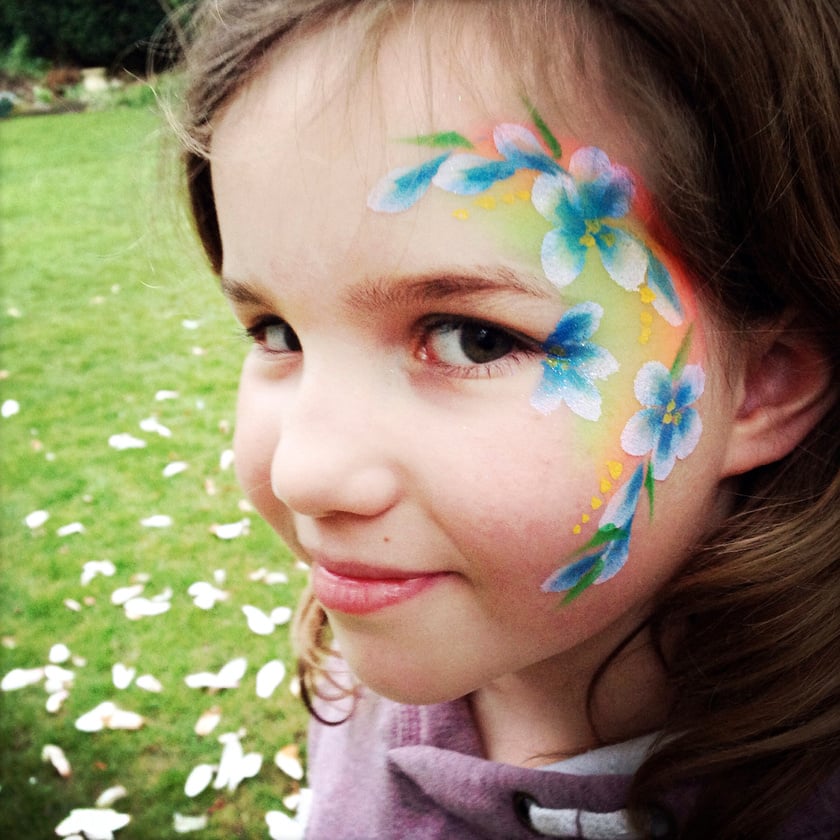 Young girl with face painted